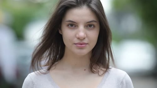 Young Beautiful Woman in the Streets Outdoors