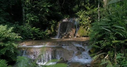 Mountain rainforest waterfalls and crystal clear water
