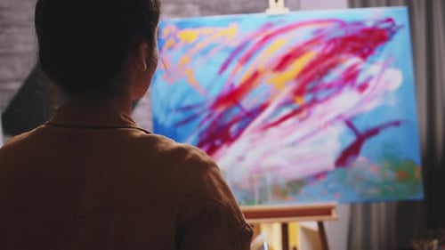 Woman Painting Abstract Art on Canvas at Home