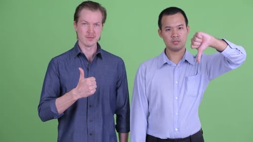 Conflicting Opinions: Men Show Thumbs Up and Down