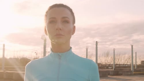 Athletic Woman Outdoors at Sunset