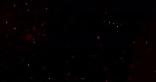 Abstract clip of dynamic sparks floating and rising