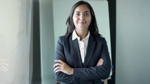 Portrait of Latin Pretty Young Businesswoman Standing in Office