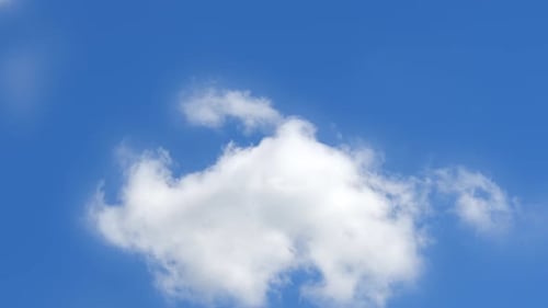 The white cloud changes its shape