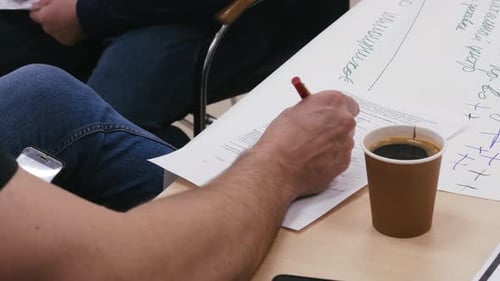Corporate Meeting in Workplace with Coffee