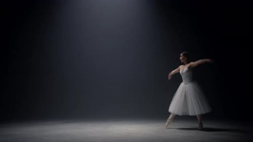 Sensual Ballerina Jumping on Stage