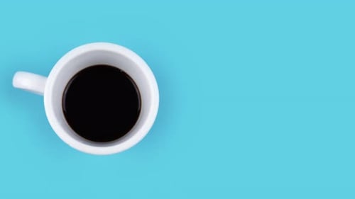 Overhead Shot of Coffee Cup on Clean Background