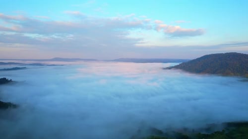 4K Aerial view of Mountains landscape with morning fog.