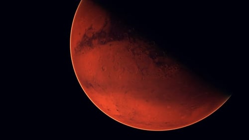 Red Planet Rotating in Deep Space with Glowing Atmosphere