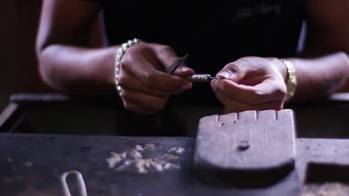 Jeweler Produces the Silver Chain.