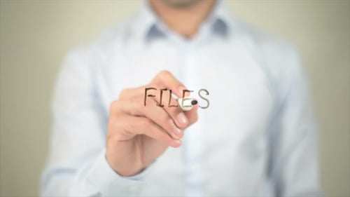 Files Man Writing on Transparent Screen