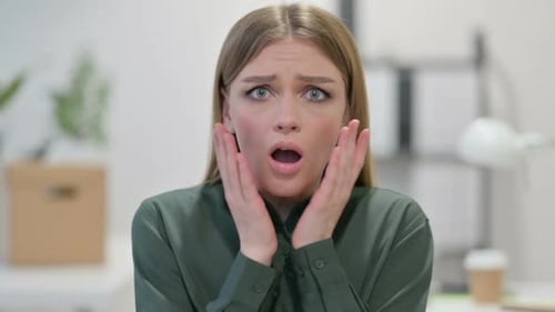 Young Woman Feeling Shocked