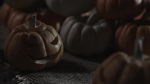 Carved Pumpkins on Burlap for Halloween Decoration