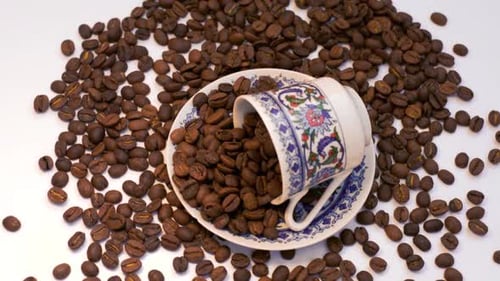 Macro shot of Coffee Beans and Cup