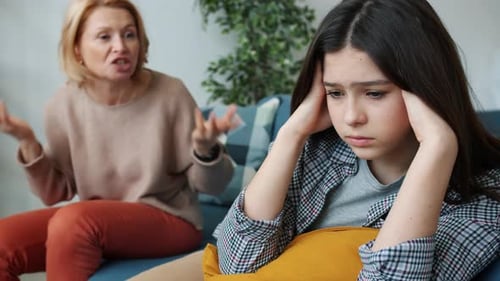 Miserable Teenage Girl Listening To Mother Yelling Abusing Child in Apartment