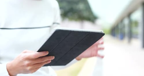 Woman working on tablet computer
