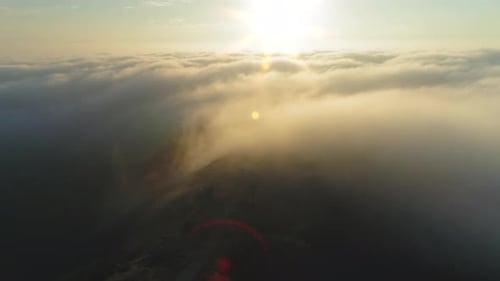 Drone Flying Through Beautiful Cloudscape on Sunrise. B Roll Footage of Skies
