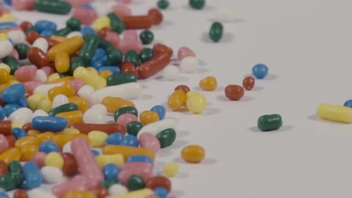 Colorful Sprinkles Scattered on a White Surface