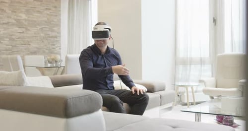 Man Using VR Headset in Modern Living Room