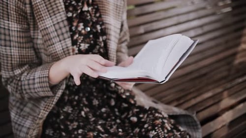 girl reading a book, a close-up book