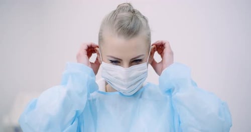 Portrait of Doctor Wearing Protective Mask in Hospital. Covid-19 Coronavirus