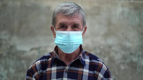 Senior Man Wearing Face Mask for Protection