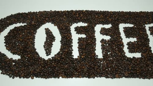 Coffee Beans Spelling Word Coffee on White Background