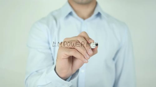 Hand Writing Empowerment on Transparent Surface