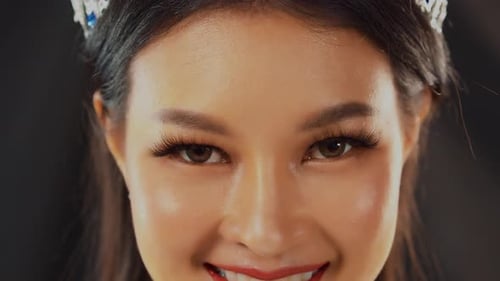 Glamorous Woman with Tiara Posing For Camera