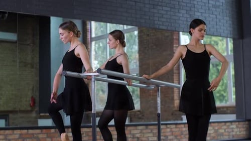 Beautiful Dancers Practice Ballet in Dance Studio