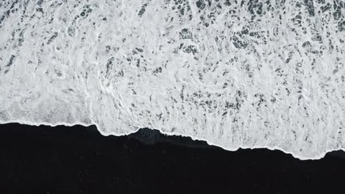 Waves Over Black Sand Beach