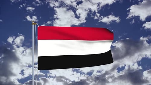 National Flag of Yemen Waving Against Blue Cloudy Sky
