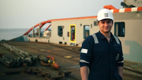 Man In Uniform on a Boat on the Ocean