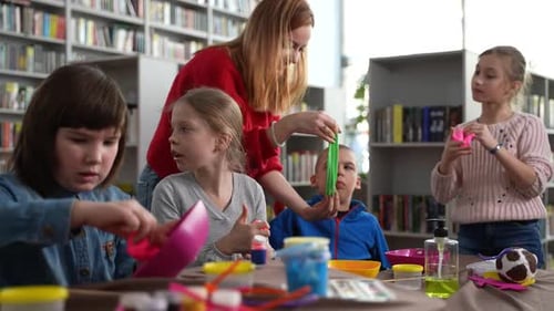 Children Making Slime with Adult Helper