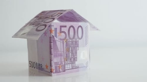 Close-up of European Union paper money made house 4K 21650p 30fps UltraHD tilting footage - Slow til