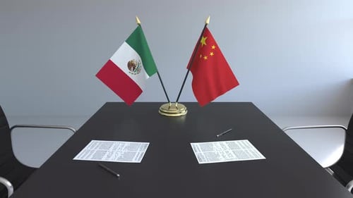 Mexico and China Flags on Conference Table Animation