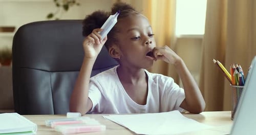 Girl Working On Art Project at Home