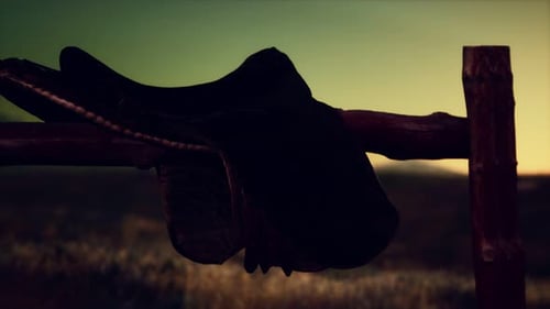 Old Saddle As the Sunset in the Country