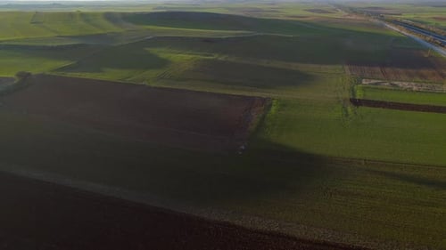 Aerial view of a crop area with a lot of grass.