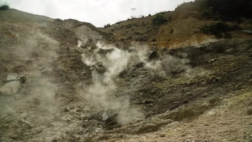 Steaming Vents on a Barren Rocky Hillside
