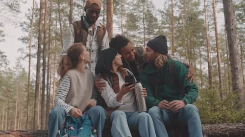 Multi-Ethnic Young People on Camping Trip in Forest