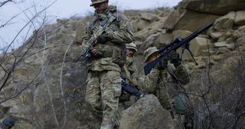Soldier Providing Cover During Patrol