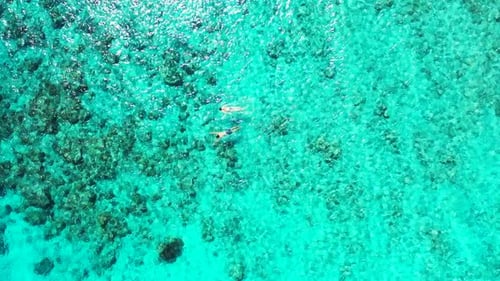 Aerial view landscape of tranquil bay beach journey by turquoise water with white sandy background o