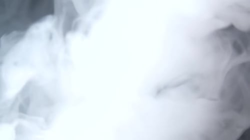 Dense White Vapor Clouds on Black Background