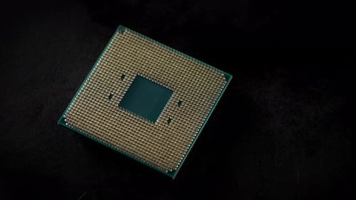 CPU. Studio Macro Photography of a Computer Processor. Gold Plated Contacts Are Visible in the Frame