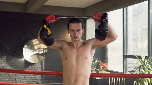 Portrait Shot of Confident Young Man in the Boxing Club
