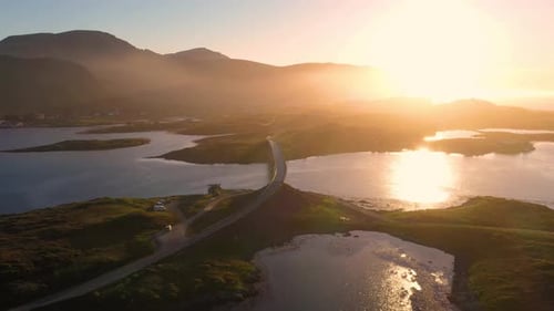 Flight over Fredvang bridge in the beautiful sunny evening, Lofoten Islands, Norway