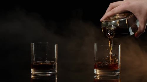 Whiskey Being Poured at Home at Night
