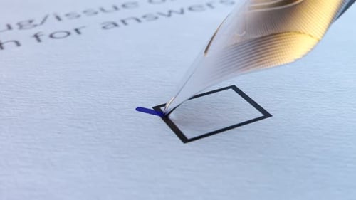 Close up of a quill pen making a check sign with ink in an empty bracket. 4K HD