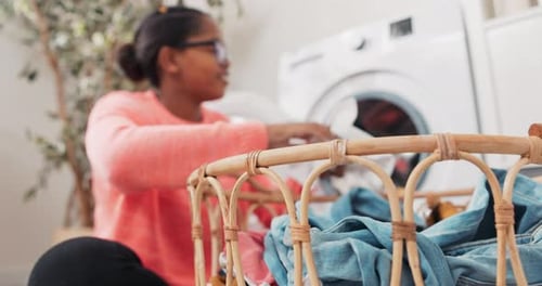 Woman Doing Laundry at Home